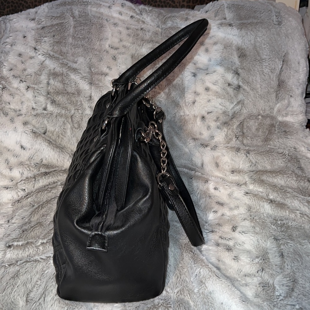 Carlos Santana Purse - Picture 2 of 16